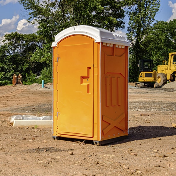 how often are the porta potties cleaned and serviced during a rental period in Wayne